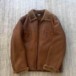 Brand new BRIONI Brown Leather Jacket with shearling inside.  Never worn!